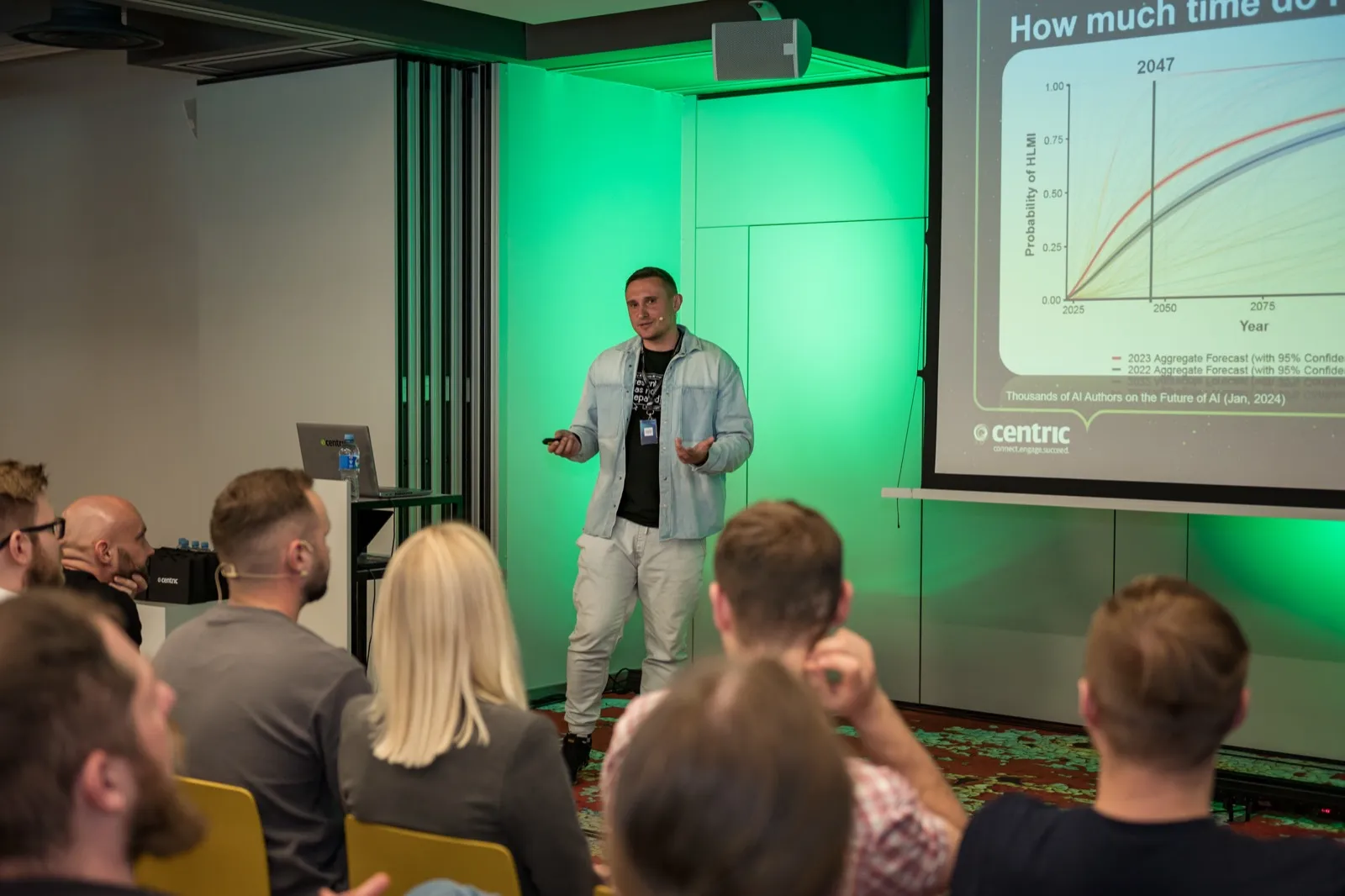 AimRank speaking at a conference